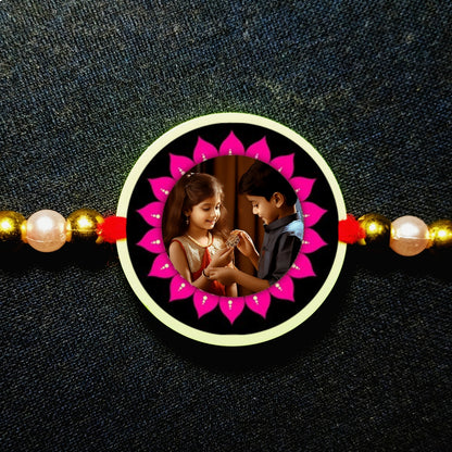 Custom pink flower Photo Rakhi [Glow In Dark Rakhi].1