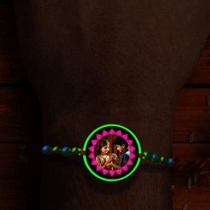 Custom pink flower Photo Rakhi [Glow In Dark Rakhi].1