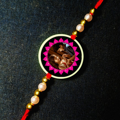 Custom pink flower Photo Rakhi [Glow In Dark Rakhi].1